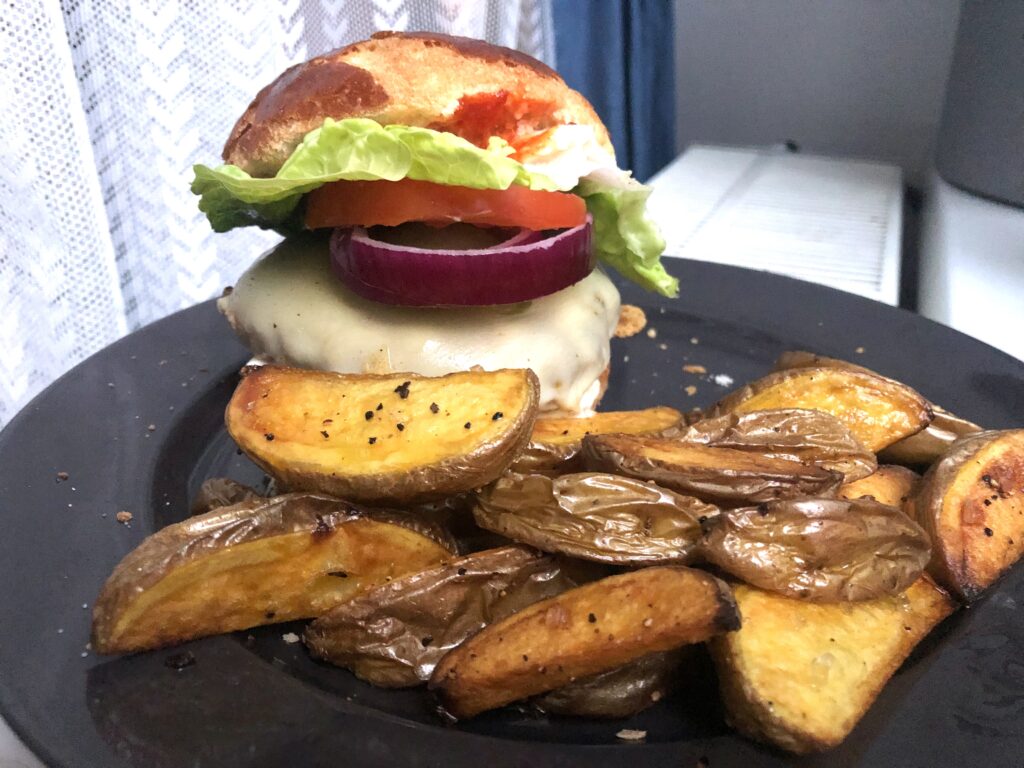 Cheeseburger with potato wedges